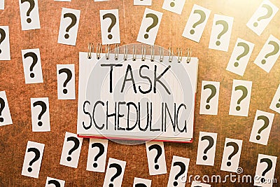 Writing displaying text Task Scheduling. Business showcase The assignment of start and end times to a set of tasks Stock Photo