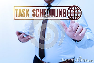 Conceptual caption Task Scheduling. Conceptual photo The assignment of start and end times to a set of tasks Presenting Stock Photo