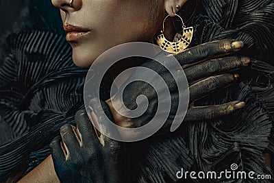 Conceptual close up portrait of beautiful fashion look woman dar Stock Photo