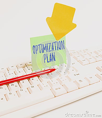 Text caption presenting Optimization Plan. Business concept Finding an alternative with the most cost effective Computer Stock Photo