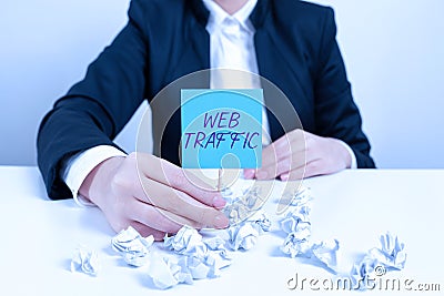 Hand writing sign Web Traffic. Business idea amount of web users and attempted visit measured of a website Stock Photo