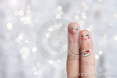 Conceptual finger art of a Happy couple. Man is giving a ring. Stock image Stock Photo