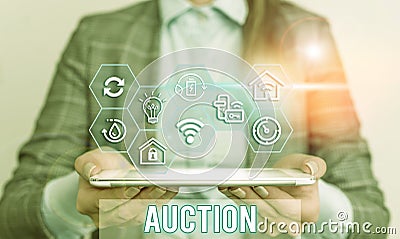 Conceptual hand writing showing Auction. Business photo text Public sale Goods or Property sold to highest bidder Purchase Stock Photo