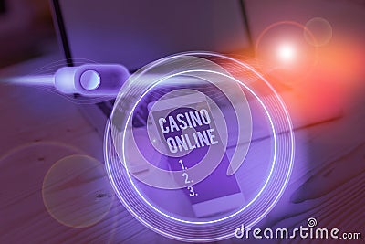 Conceptual hand writing showing Casino Online. Business photo showcasing gamblers can play and wager on casino games through Stock Photo