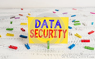 Conceptual hand writing showing Data Security. Business photo showcasing the process of protecting data from unauthorized access Stock Photo