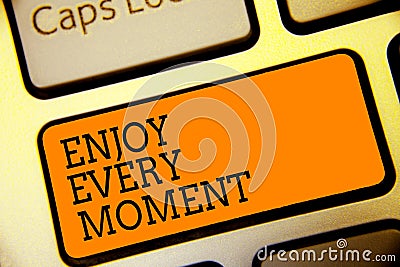 Conceptual hand writing showing Enjoy Every Moment. Business photo text being pleased with your life Have fun Precious time Button Stock Photo