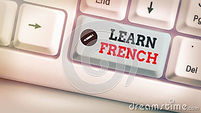 Conceptual hand writing showing Learn French. Business photo text get knowledge or skill in speaking and writing French language Stock Photo
