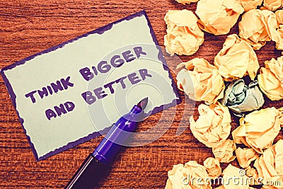 Conceptual hand writing showing Think Bigger And Better. Business photo showcasing no Limits be Open minded Positivity Big Picture Stock Photo