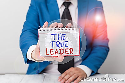 Conceptual hand writing showing The True Leader. Business photo text one that move and encourage group of showing Stock Photo