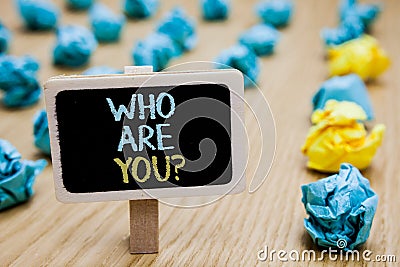 Conceptual hand writing showing Who Are You question. Business photo text Identify yourself description personal characteristics p Stock Photo