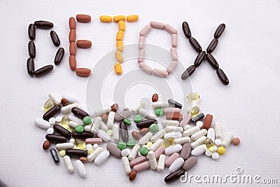 Conceptual Hand writing text caption inspiration Medical care Health concept written with pills drugs capsule word detox On white Stock Photo