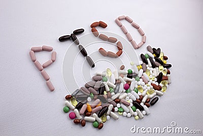 Conceptual Hand writing text caption inspiration Medical care Health concept written with pills drugs capsule word PTSD On white i Stock Photo