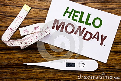 Conceptual hand writing text caption showing Hello Monday. Business concept for Day Week Start written on sticky note paper on woo Stock Photo