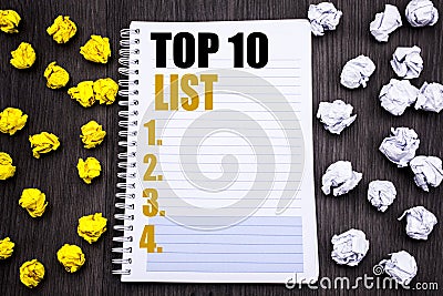 Conceptual hand writing text caption showing Top 10 Ten List. Business concept for Success ten list Written on notepad note notebo Stock Photo