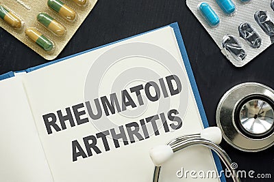 Conceptual hand written text showing Rheumatoid arthritis Stock Photo