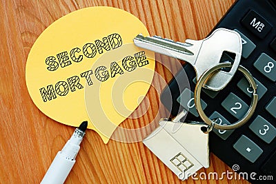 Conceptual hand written text showing second mortgage Stock Photo