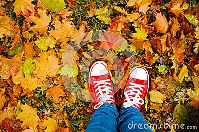 Conceptual hipster style image of legs in boots, trendy gumshoes Stock Photo