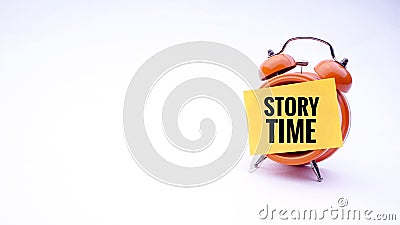 Conceptual image of Business Concept with words Story Time on a clock with a white background. Selective focus. Stock Photo