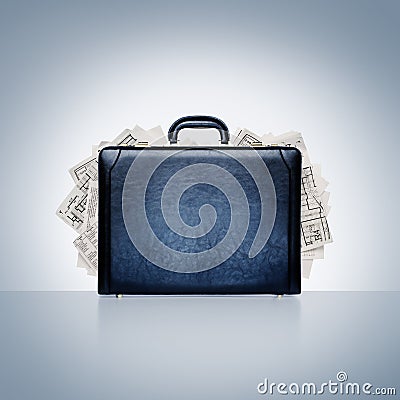Black leather briefcase overflowing with plans, reports, and paperwork. Intellectual property and data Stock Photo