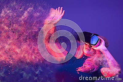 Conceptual image of woman wearing VR headset Stock Photo