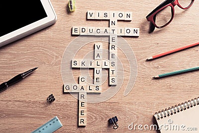 Conceptual keywords on wooden table with elements of game making crossword Stock Photo
