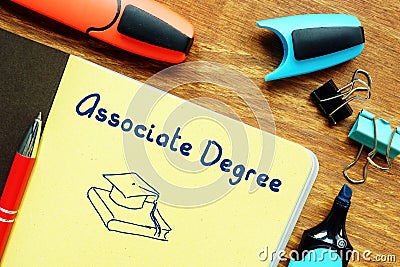 Conceptual photo about Associate Degree with handwritten phrase Stock Photo
