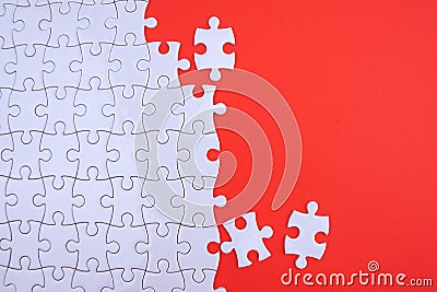Conceptual photo of copyspace red background missing jigsaw puzzle. Image for motivation, inspiration and consultation, ideation Stock Photo