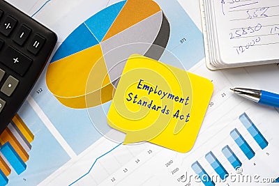 Conceptual photo about Employment Standards Act with handwritten phrase Stock Photo