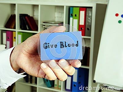 Conceptual photo about Give Blood with handwritten text Stock Photo