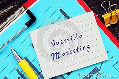 Conceptual photo about Guerrilla Marketing with handwritten phrase Stock Photo