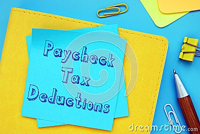 Conceptual photo about Paycheck Tax Deductions with handwritten text Stock Photo