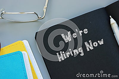 Conceptual photo about We`re Hiring Now with written phrase Stock Photo