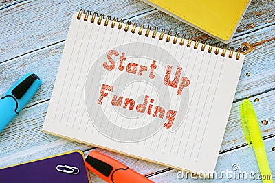 Conceptual photo about Start Up Funding with handwritten phrase Stock Photo