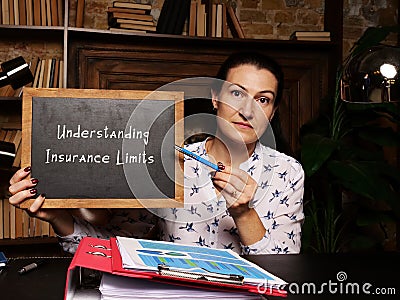 Conceptual photo about Understanding Insurance Limits with written phrase on the chalkboard Stock Photo