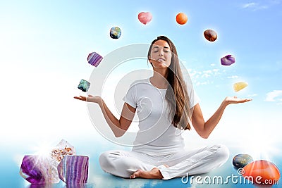 Conceptual yoga with gemstones. Stock Photo