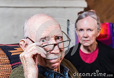 Concerned Elderly Couple Stock Photo