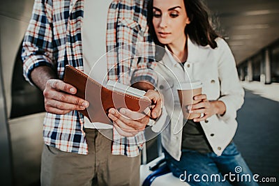 Concerned female is watching at ticket outside Stock Photo