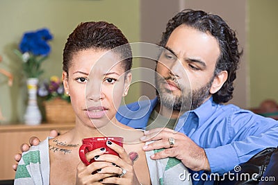 Concerned Husband and Sad Wife Stock Photo