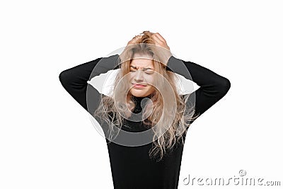 Concerned, worried and anxious young woman grab head and panicking, feel scared and nervous, dont know what do Stock Photo