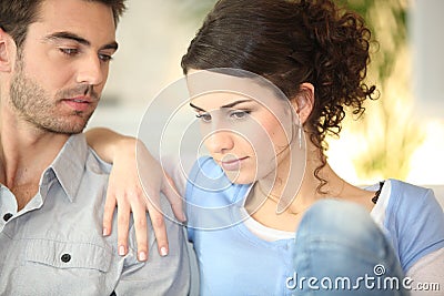 Concerned young couple Stock Photo