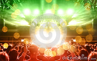 Concert hall during a gig with many fans Editorial Stock Photo