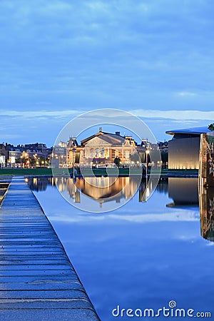 Concert hall at twilight reflected in a pond, Amsterdam, Netherlands Editorial Stock Photo