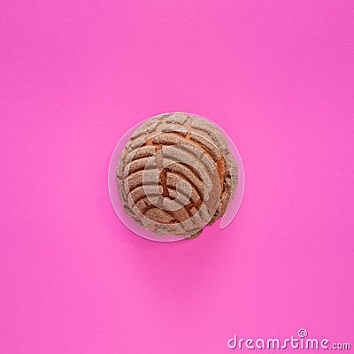 Concha Bread, Mexican Sweet Scone on Pink Surface. Stock Photo