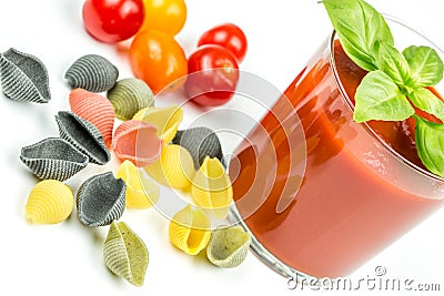 Conchiglie pasta and tomatoes with juice Stock Photo