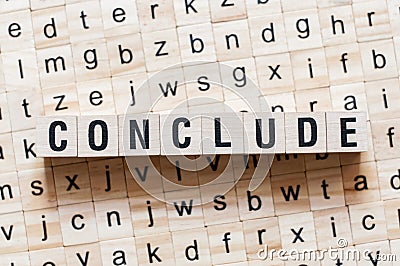 Conclude word concept on cubes Stock Photo