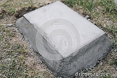 concrete block embeded on a ground Stock Photo