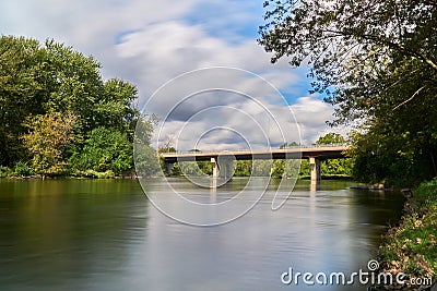 Concrete bridge over fox river on a cloudy day Stock Photo