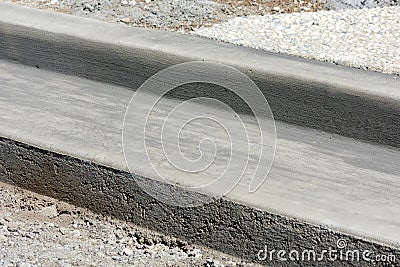 Concrete curb installation details. Stock Photo