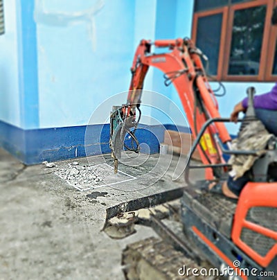 Concrete drilling machine around the building Stock Photo