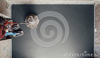 Concrete floor final grinding, top view Stock Photo